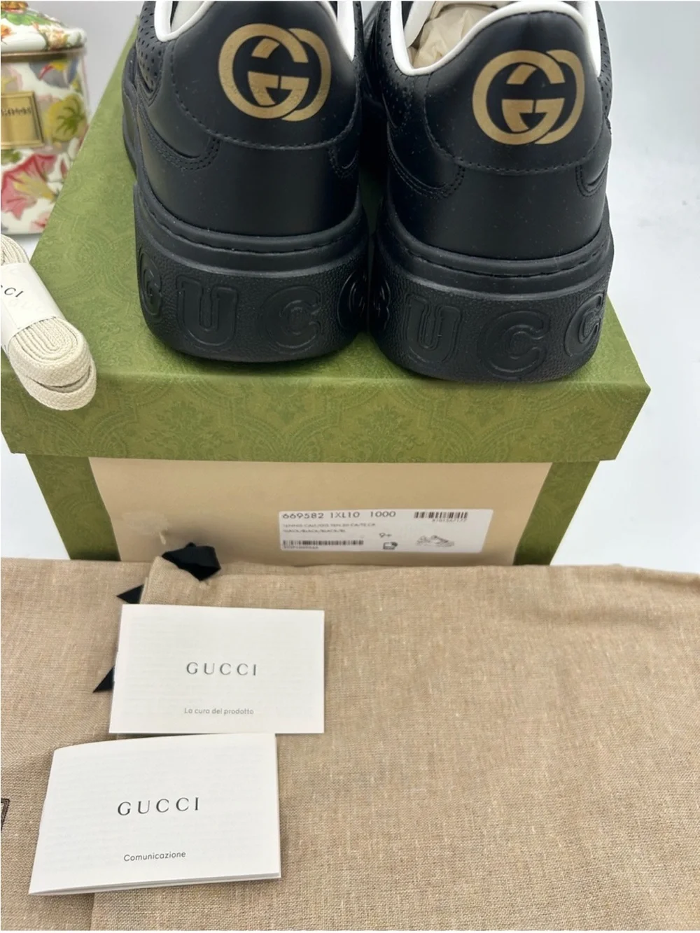 Men’s Gucci, Gigi embossed leather sneakers size 9.5 it’s 10.5 US made in Italy